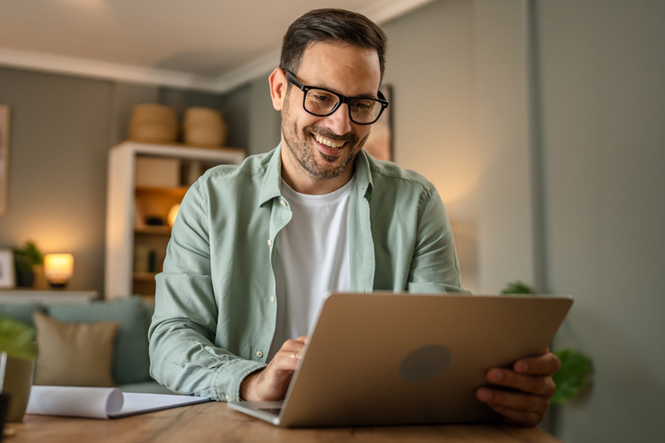 man using laptop computer